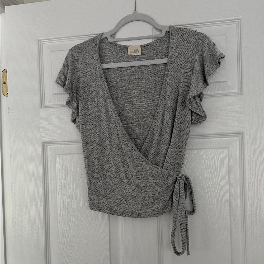 Caution to the Wind Flutter Sleeve Wrap Top